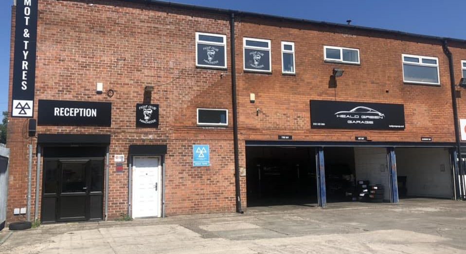 Heald Green Garage outside of the front workshop - Tyres and MOT Wythenshawe